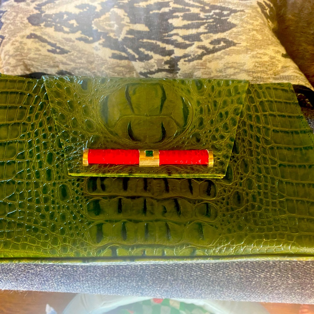 Gorgeous green clutch with red clasp. Envelope style